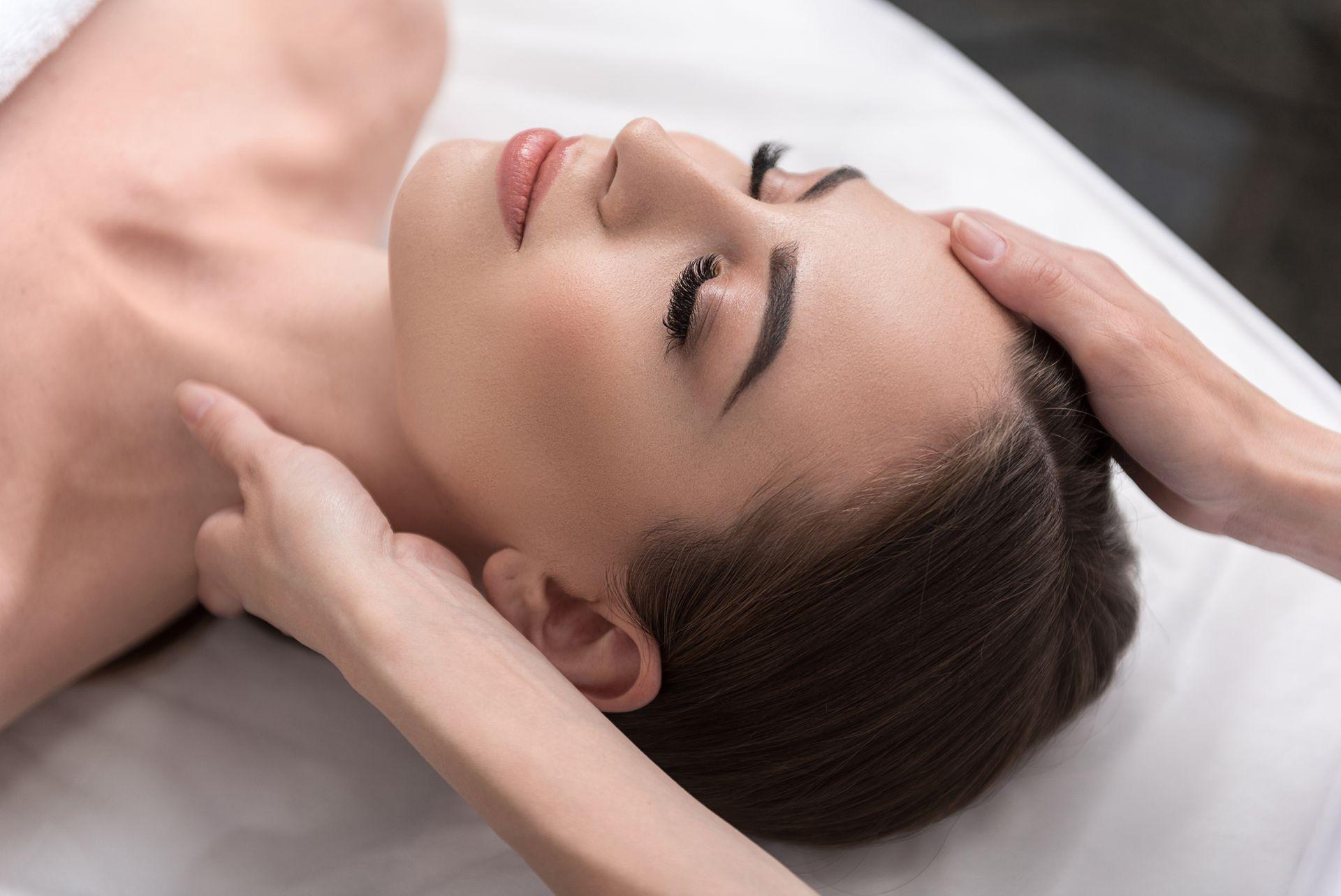 Professional neck and shoulder pain relief massage at Avy Spa Palo Alto, specializing in deep tissue and lymphatic therapy.